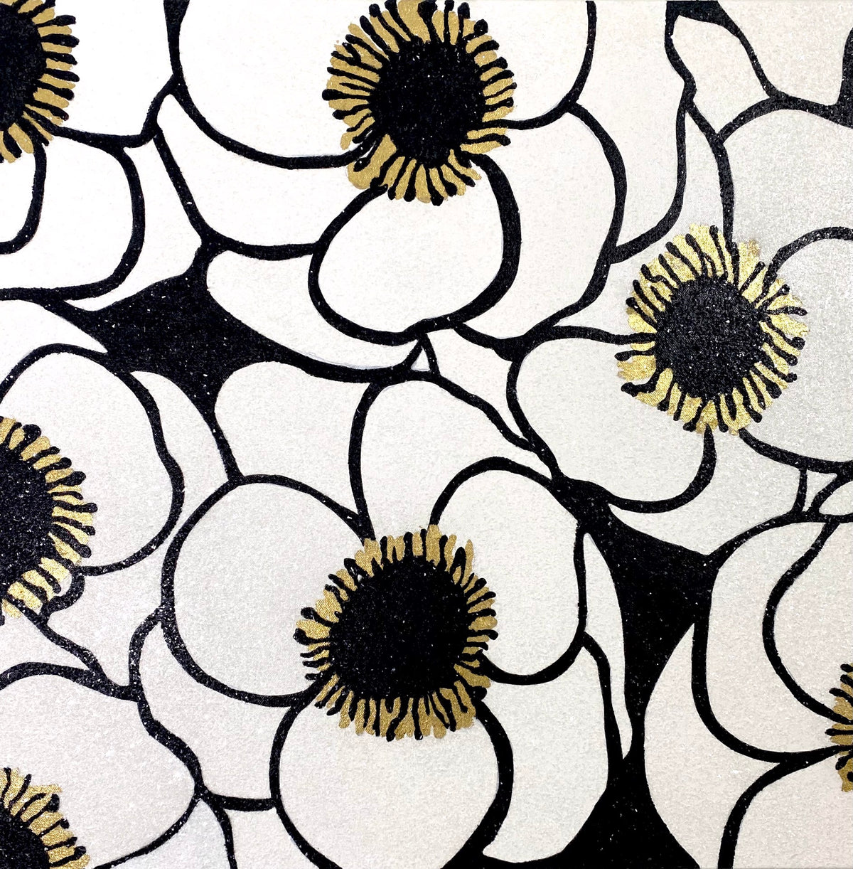 Black and white stylized flowers with gold accents on the centers, outlined in black, filling the image in a repeating pattern.