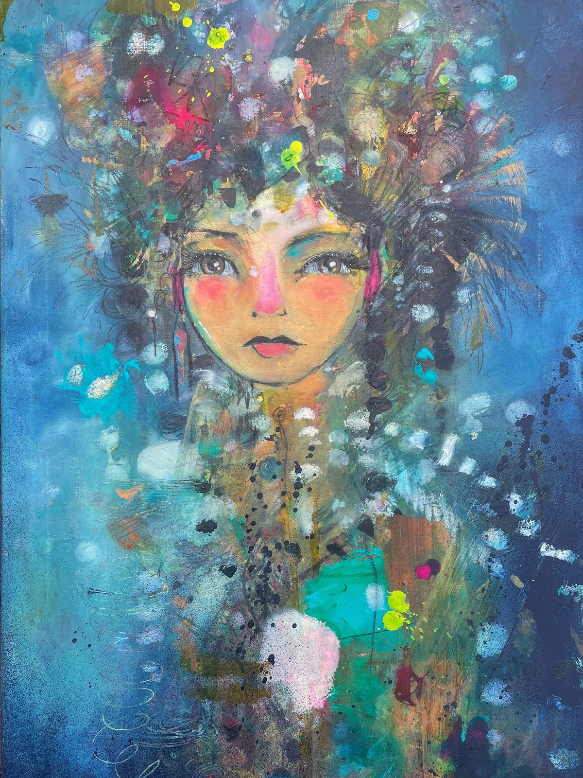 Abstract painting of a woman with large eyes, bright pink cheeks, and colorful, textured hair against a blue background with scattered paint splatters and patterns.