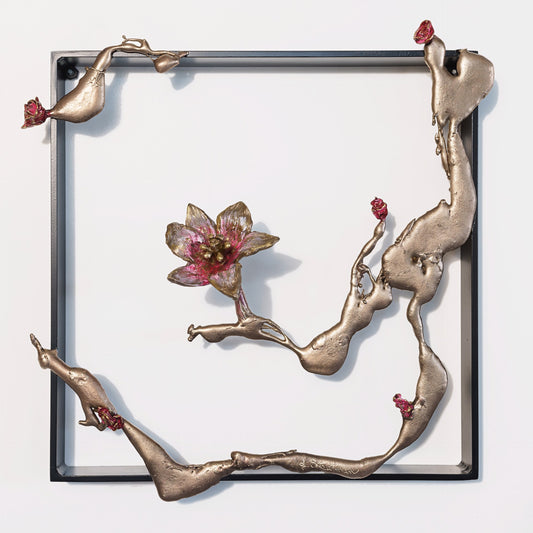 Metallic frame with organic bronze branches and pink flower accents.