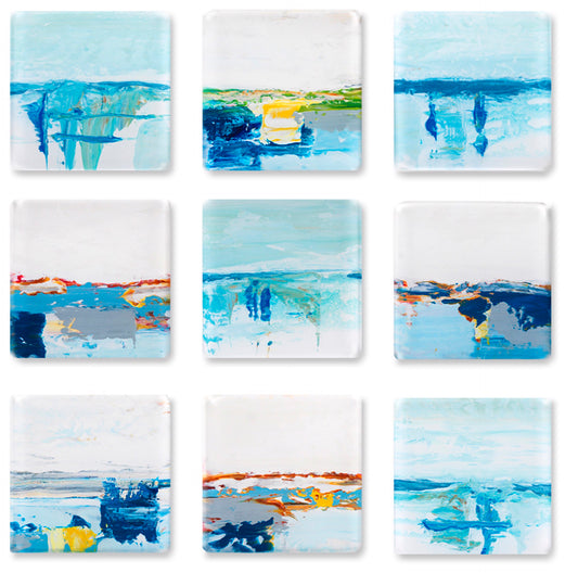 Nine abstract blue and white paintings arranged in a 3x3 grid.