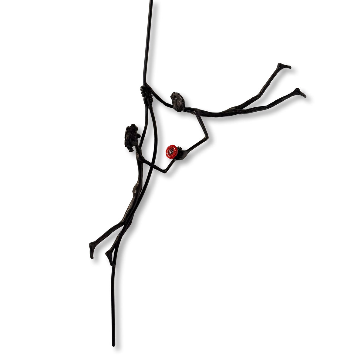 Minimalist sculpture of a stick figure floating while holding a red balloon. (view 2)