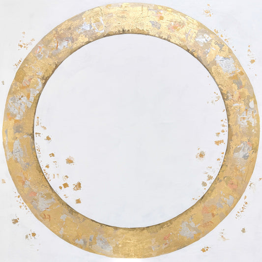 A circular gold and silver leaf ring on a white background, with patches of leafing in various places.