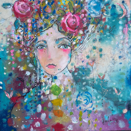 A colorful abstract painting of a woman's face with large eyes, surrounded by vibrant flowers and foliage in her hair, set against a blue and multicolored background.