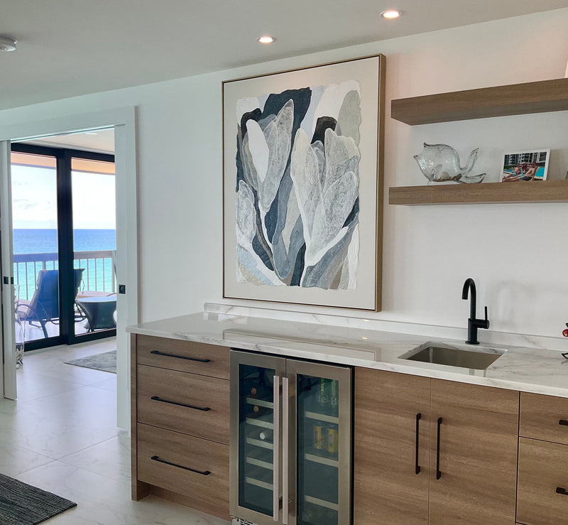 Vesela Baker gray and white abstract painting above a wet bar in an oceanfront condo, South Florida
