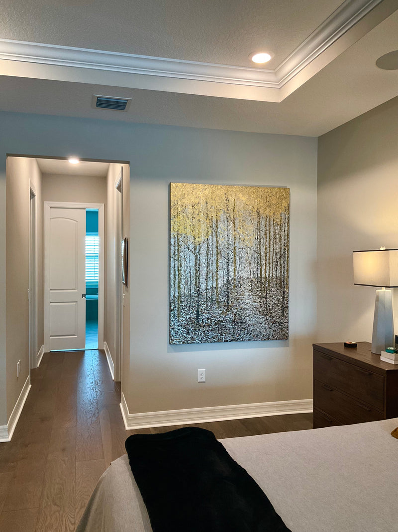 Barrett Edwards painting of golden birch trees in a bedroom near a hallway