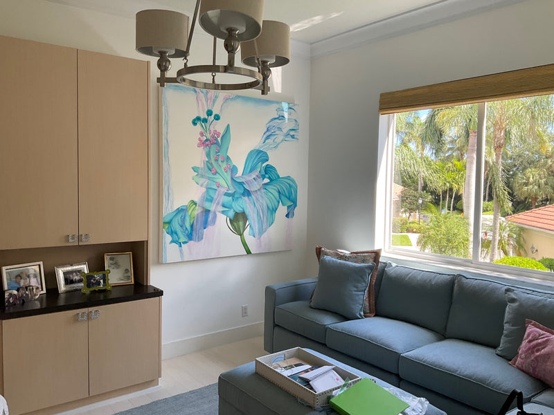 Deborah Bigeleisen large painting of turquoise and pink flowers in a family room with tropical garden views