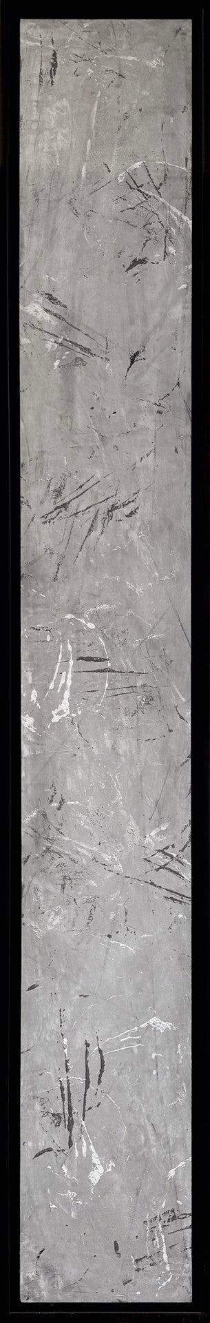 A slim panel featuring white gray and black abstract markings