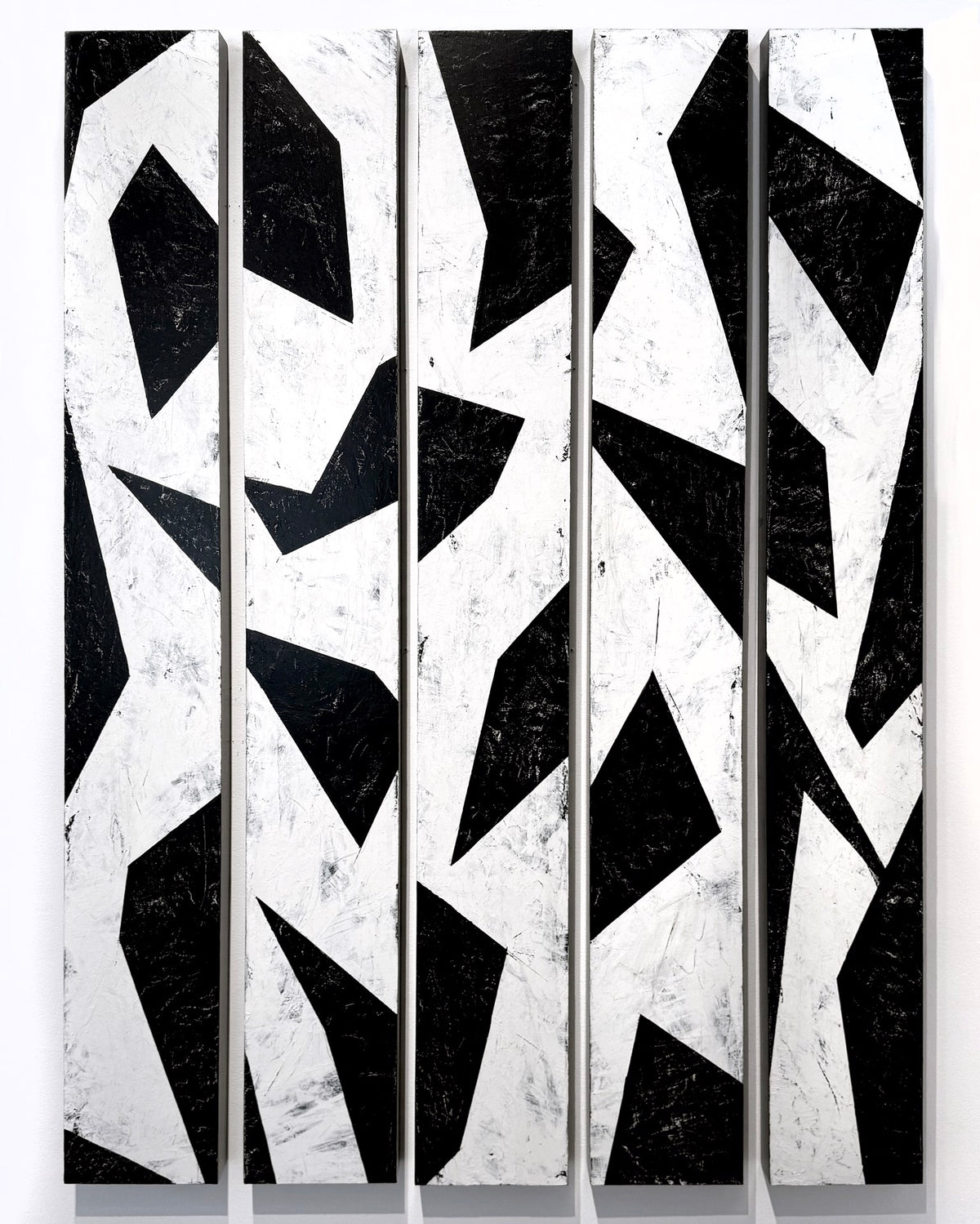Abstract black-and-white geometric painting across five vertical panels.